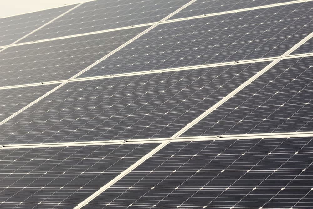 An array of solar thermal collector panels on a roof